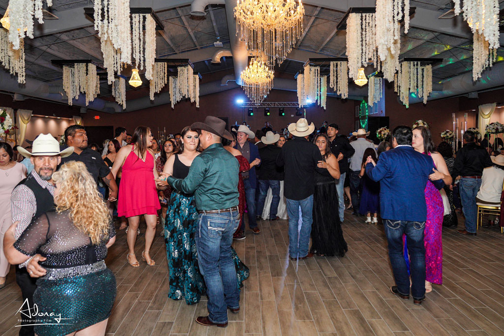 People dancing at a wedding reception venue at the Villa Coronado Venue in San Antonio, TX